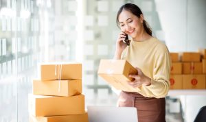 Asian,Sme,Business,Women,Use,Laptop,Computer,Checking,Customer,Order